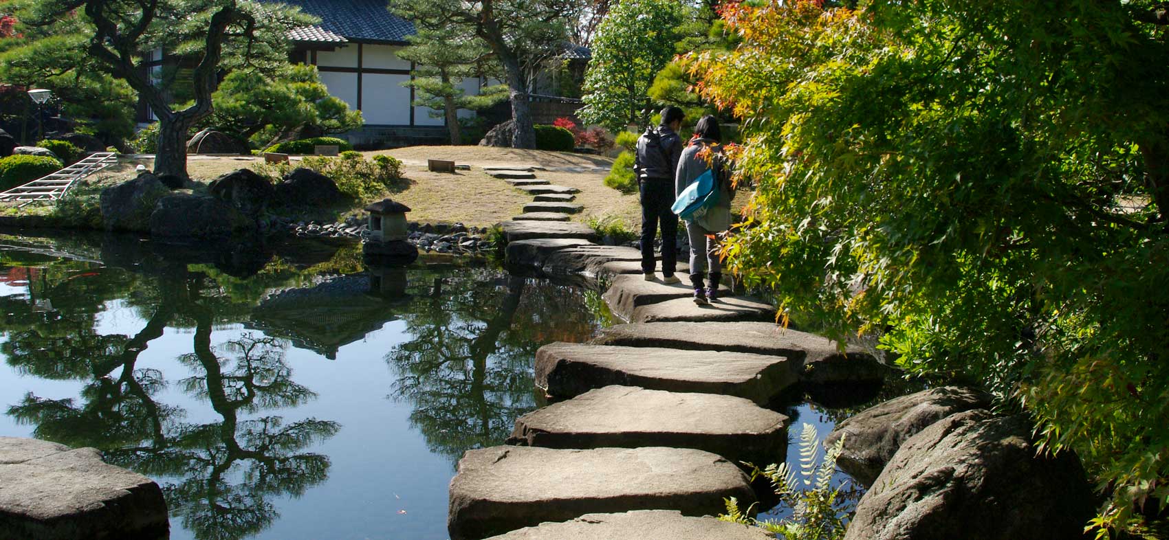 Smooth stones used as stepping stone bridge Hemi-ji – Garden of Lords Residence